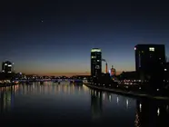 Photo of the Frankfurt skyline at night.