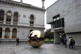 Photos of Trinity College Campus and the Long Room in the Trinity Library.