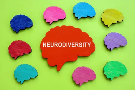 Colorful brains and one with inscription Neurodiversity.