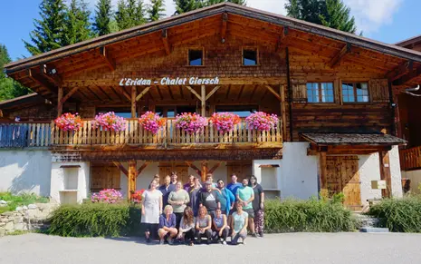 Group photo of the seminar members in front of the accommodation.