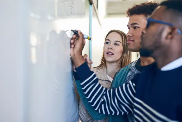 University, whiteboard and teacher with students in class writing for math lesson, learning and exam. Education, teaching and learners with equation for knowledge, assignment and study in college