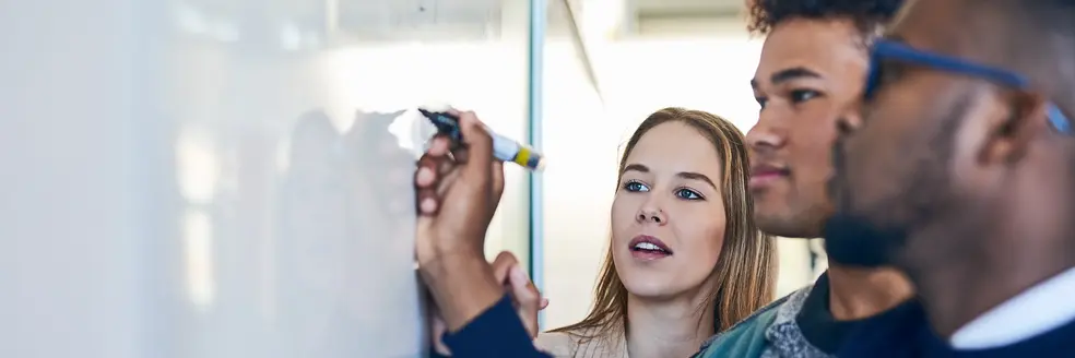 University, whiteboard and teacher with students in class writing for math lesson, learning and exam. Education, teaching and learners with equation for knowledge, assignment and study in college