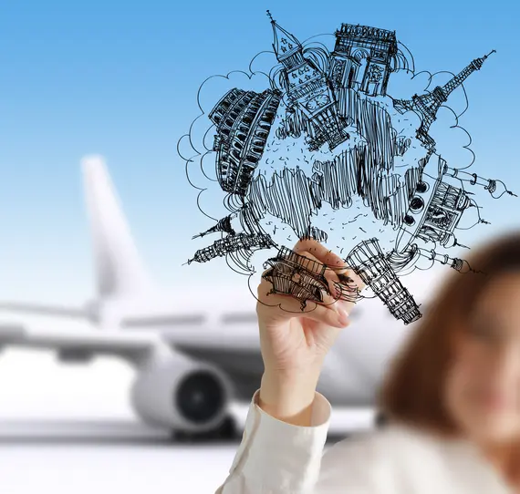 female hand draws dream travel