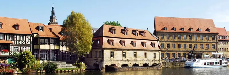 View from the river Regnitz to the buildings of the Institute of Geography.