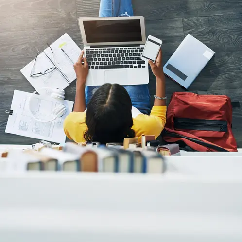 Student laptop, phone screen and top view woman typing research project, university paper or study for college exam. School library, floor and e learning person search online for education info