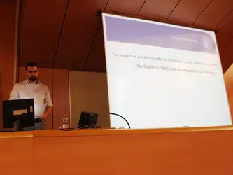 Photo of Martin Schneidmadel giving his talk.