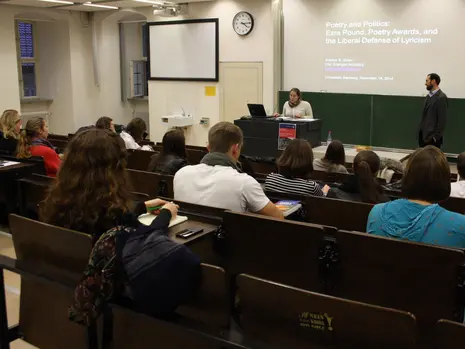 Photo of Prof. Dr. Andre S. Gross giving his talk and attendees listening to him.