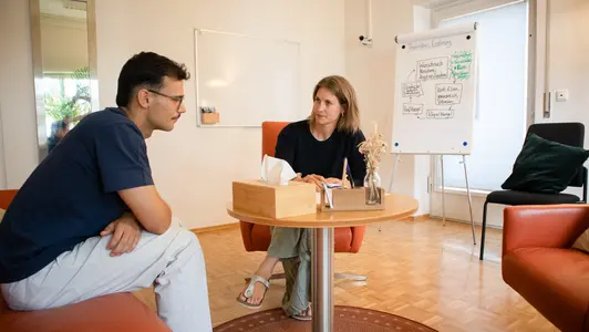 Personen in der Psychotherapeutischen Ambulanz.