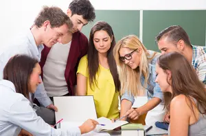 students looking at tablet pc