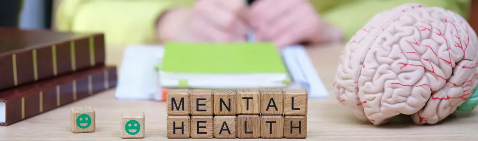Exploring mental health through understanding, awareness, and support during a bright afternoon in a serene workspace