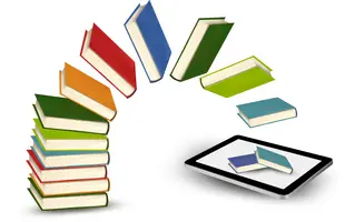 Flying books books flying into a tablet