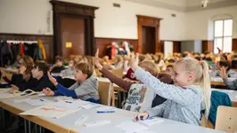 Kinderuni Bamberg Kinder im Vorlesungssaal bei der Kinderuni