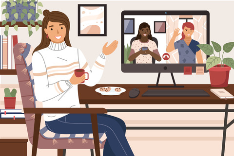 Image of a young woman sitting at her desk, holding a coffee and talking to two other people via a video call.